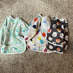 Set of three used food/crafting smocks for toddlers
